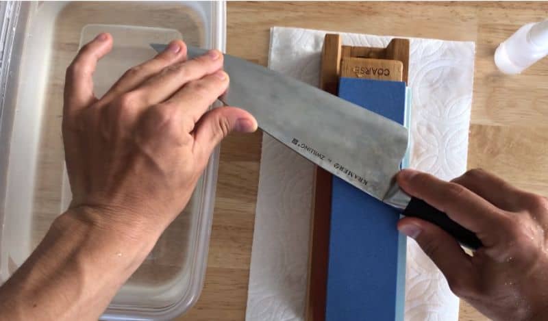 sharpening a wusthof knife with whetstone
