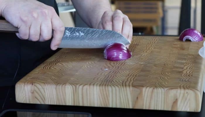 slicing onions with santoku knife