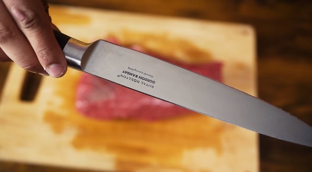 cutting meat with gordon ramsay knife