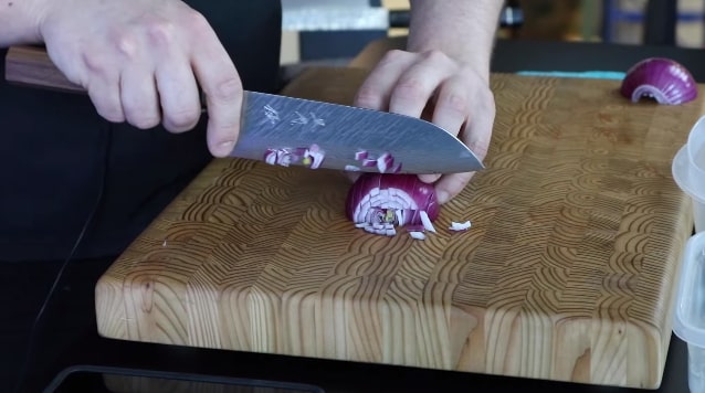cutting onions with a santoku knife
